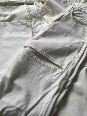 Aritzia white denim jeans with cute streetwear cutout design